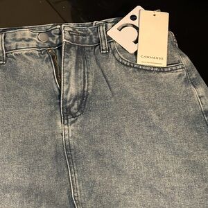 Blue Jean skirt with front split.